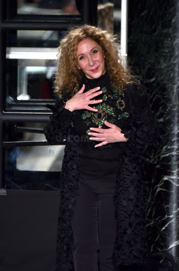 Reem Acra greets the audience after presenter her Reem Acra Bridal Collection at Tiffany and Co. stock photos