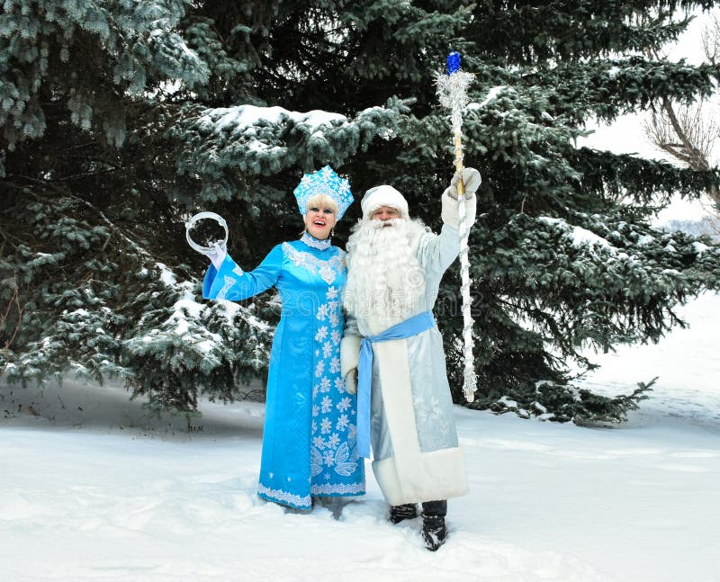 Russian Christmas characters Ded Moroz Father Frost and Snegurochka Snow Maiden. Outdoors stock photography