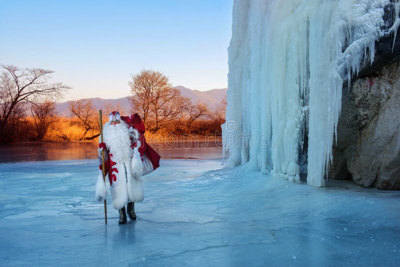 Russian Ded Moroz. Russian character Ded Moroz on icy background stock photos