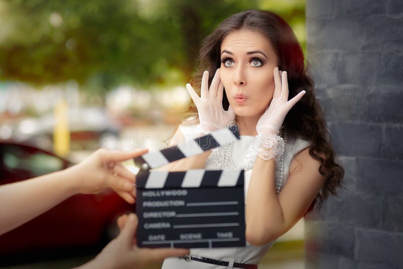 Surprised Actress Shooting Movie Scene. Young professional cinema star acting in a film royalty free stock photos