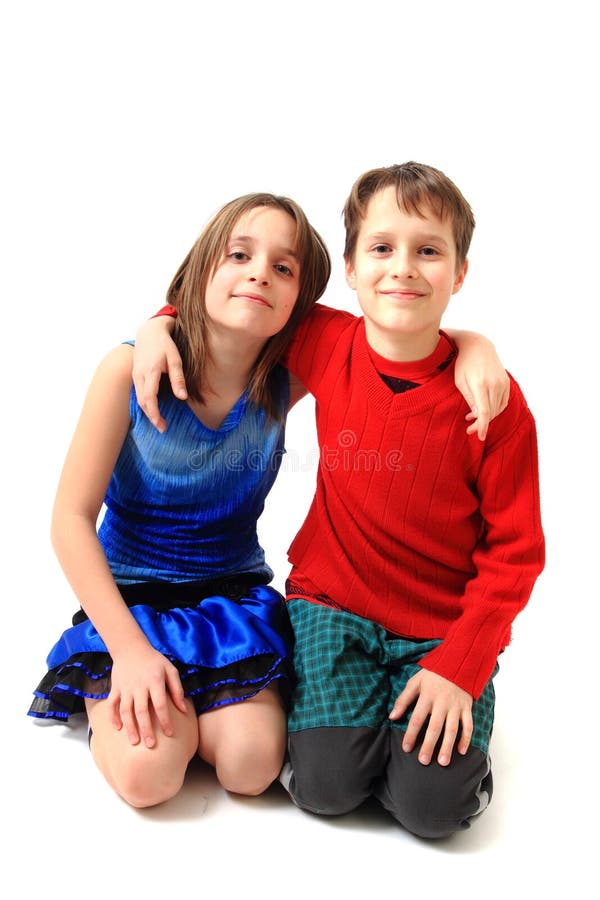 Twins (brother and sister) portrait. Isolated on the white background royalty free stock photo